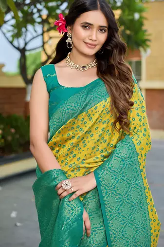 Banarasi satin silk saree floral zari woven saree with mustard color and turquoise blue border tassels