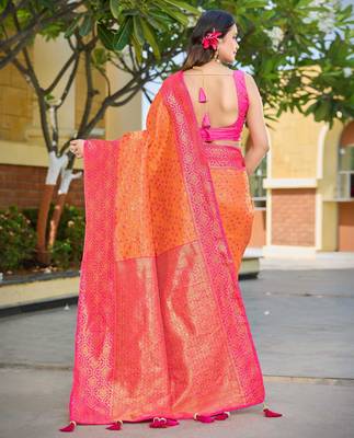 Banarasi satin silk blend saree floral zari woven saree with orange color and pink border & tassels 2