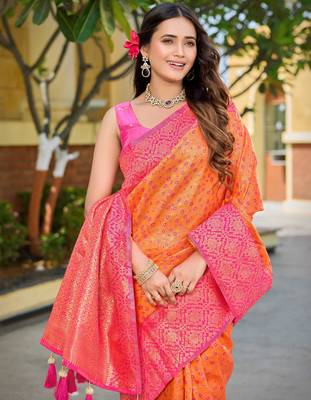 Banarasi satin silk blend saree floral zari woven saree with orange color and pink border & tassels 3