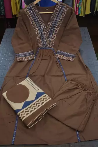 Beautiful jaipuri brown cotton kurti pant set with a geometric print dupatta and intricate embroidery detailing