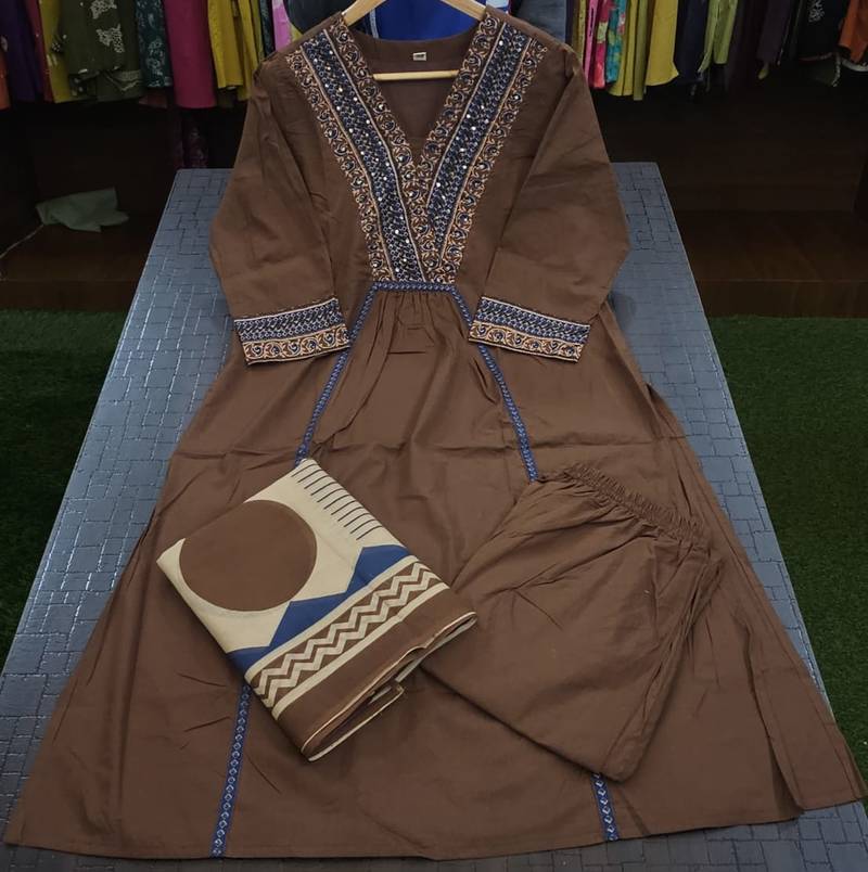 Beautiful jaipuri brown cotton kurti pant set with a geometric print dupatta and intricate embroidery detailing