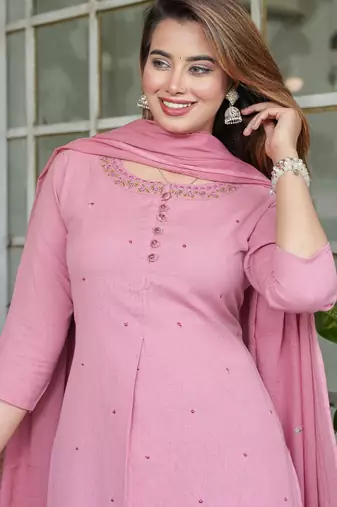 Beautiful pink three-piece salwar suit set.