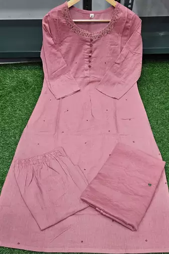 Beautiful pink three-piece salwar suit set.