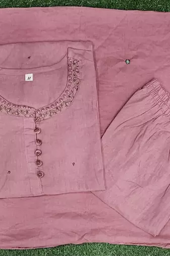 Beautiful pink three-piece salwar suit set.