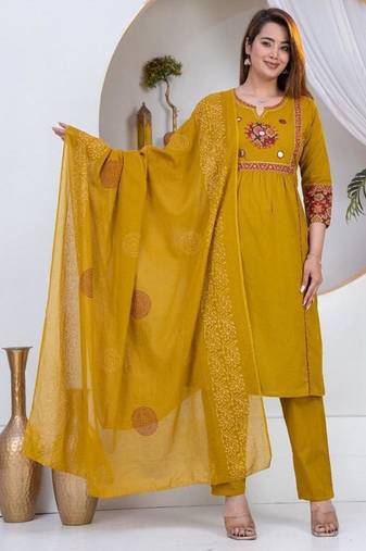 Beautiful three-piece salwar suit set in mustard yellow.