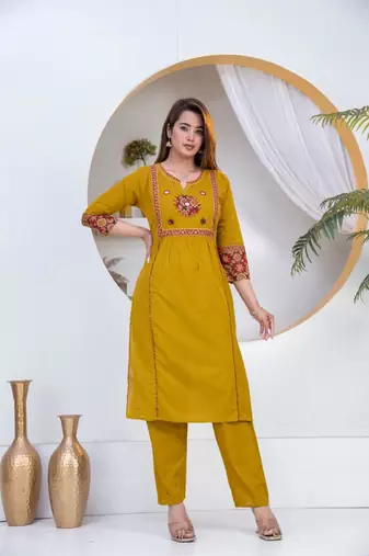 Beautiful three-piece salwar suit set in mustard yellow.