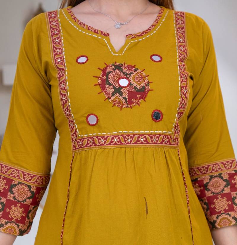 Beautiful three-piece salwar suit set in mustard yellow.