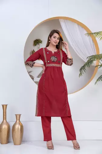Beautiful three-piece salwar suit set in maroon.