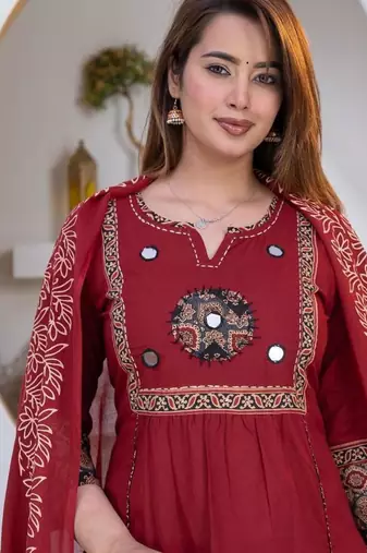Beautiful three-piece salwar suit set in maroon.