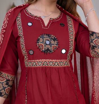 Beautiful three-piece salwar suit set in maroon. 4