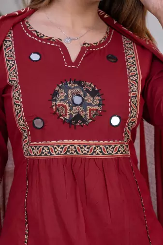 Beautiful three-piece salwar suit set in maroon.