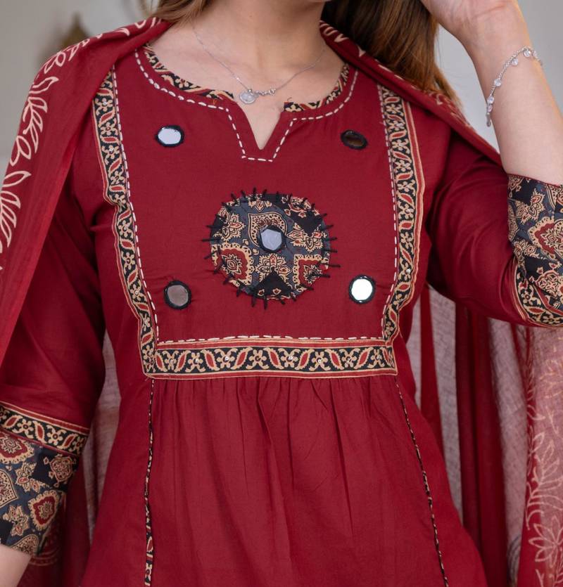 Beautiful three-piece salwar suit set in maroon.