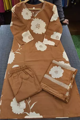 Beautiful printed rust kurta set with pant and dupatta