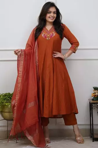 Beautiful  a rust colored embroidered cotton blend anarkali suit set with a dupatta