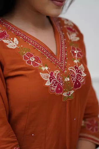 Beautiful  a rust colored embroidered cotton blend anarkali suit set with a dupatta