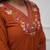 Beautiful  a rust colored embroidered cotton blend anarkali suit set with a dupatta