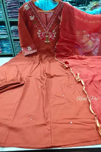 Beautiful  a rust colored embroidered cotton blend anarkali suit set with a dupatta