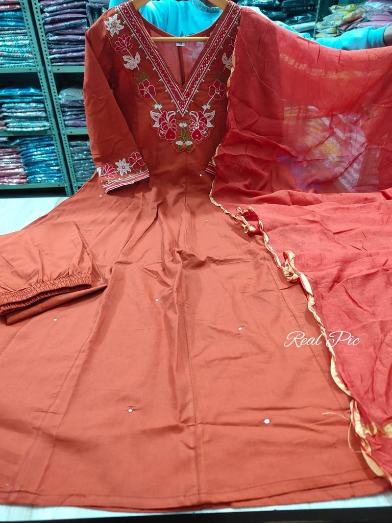 Beautiful  a rust colored embroidered cotton blend anarkali suit set with a dupatta