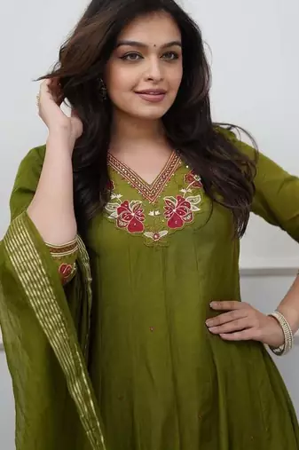 Beautiful  a green colored embroidered cotton blend anarkali suit set with a dupatta
