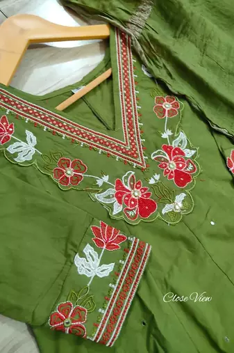 Beautiful  a green colored embroidered cotton blend anarkali suit set with a dupatta