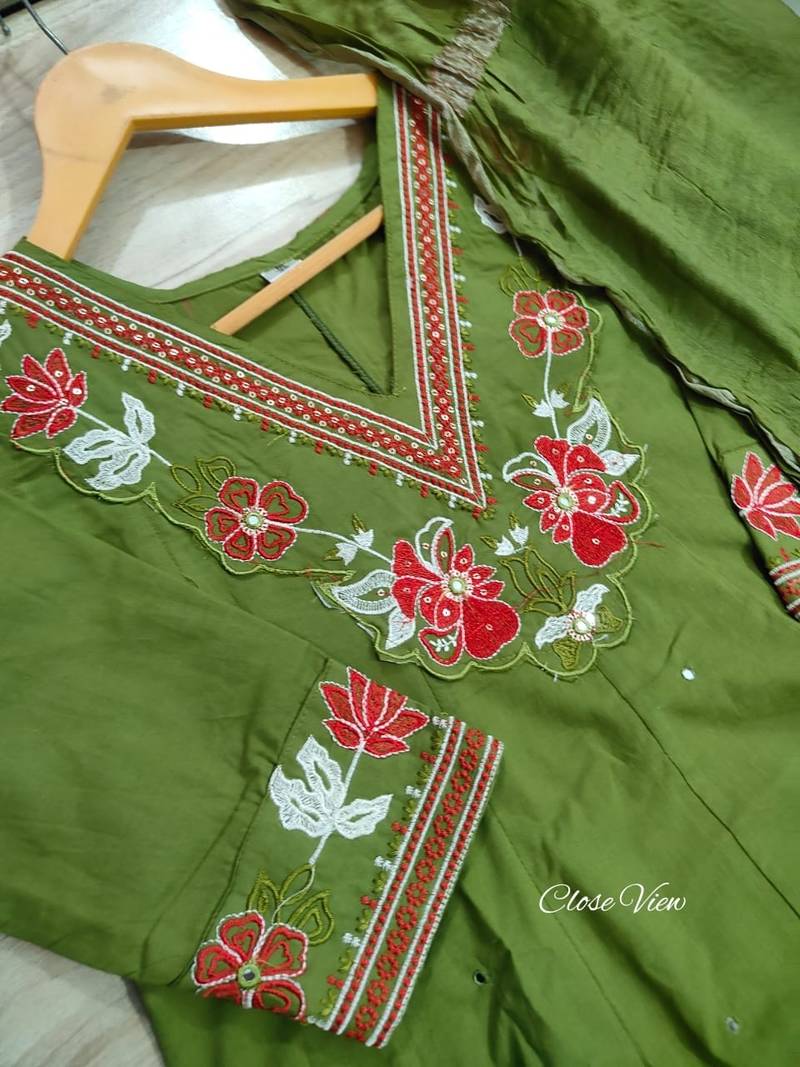 Beautiful  a green colored embroidered cotton blend anarkali suit set with a dupatta