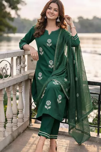 Beautiful  a dark green cotton kurta pant set featuring white floral embroidery and a matching dupatta