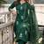 Beautiful  a dark green cotton kurta pant set featuring white floral embroidery and a matching dupatta