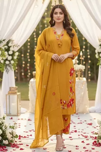 Beautiful  a mustard yellow embroidered kurta pant dupatta set.