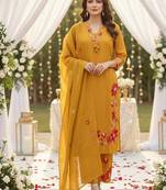 Beautiful  a mustard yellow embroidered kurta pant dupatta set.