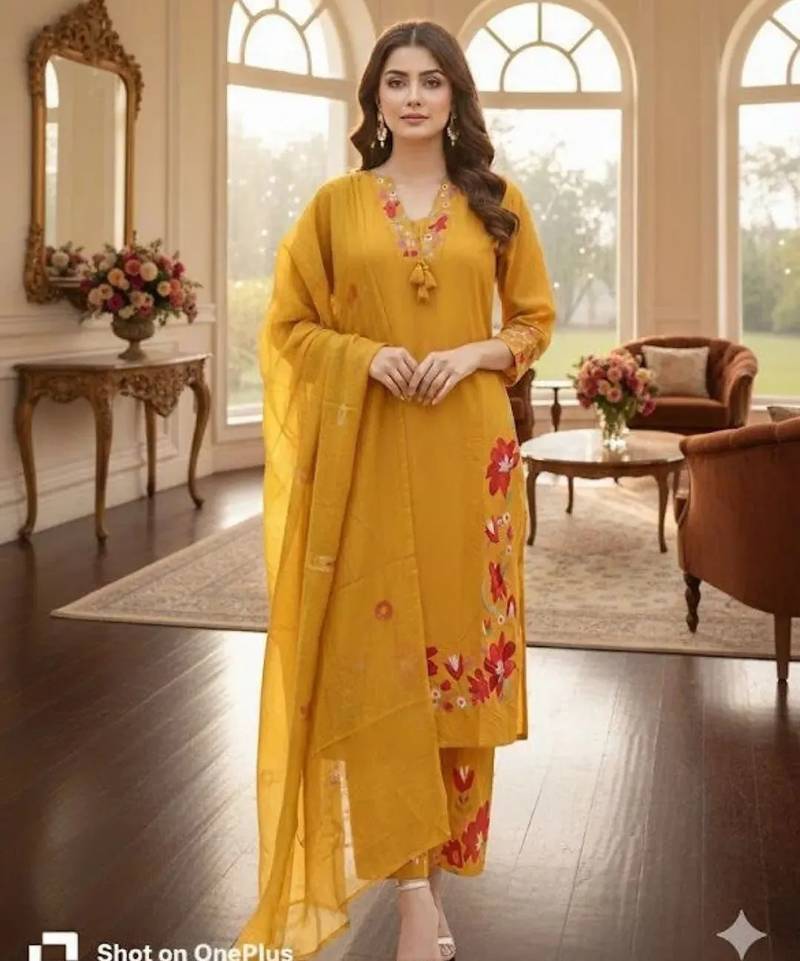 Beautiful  a mustard yellow embroidered kurta pant dupatta set.