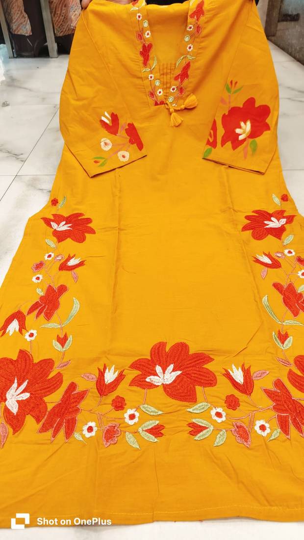 Beautiful  a mustard yellow embroidered kurta pant dupatta set.
