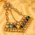 Regal triangle kundan stone jhoomer