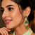 Emerald bloom cz dangler earrings