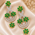 Emerald bloom cz dangler earrings