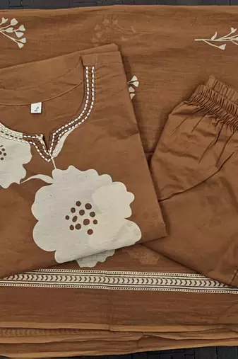 Beautiful printed rust kurta set with pant and dupatta