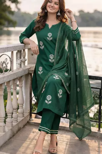 Beautiful  a dark green cotton kurta pant set featuring white floral embroidery and a matching dupatta