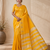 yellow fancy with tassels on pallu tussar silk saree