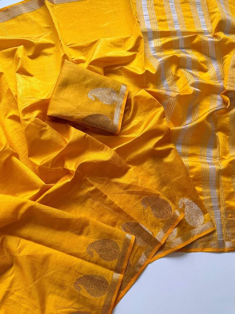 yellow fancy with tassels on pallu tussar silk saree