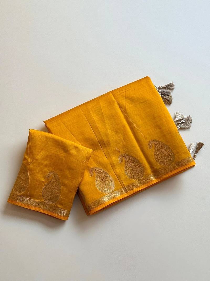 yellow fancy with tassels on pallu tussar silk saree