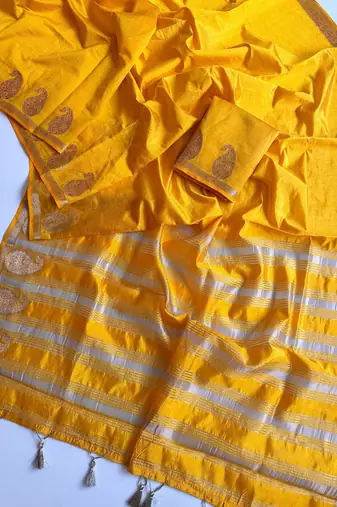 yellow fancy with tassels on pallu tussar silk saree