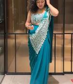 Rama green embroidered faux georgette ready to wear saree with blouse
