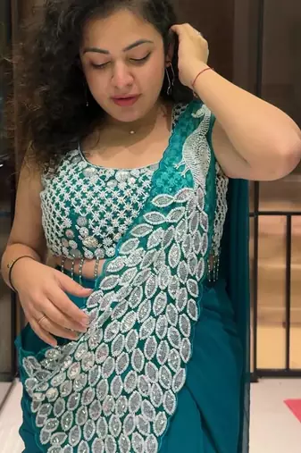 Rama green embroidered faux georgette ready to wear saree with blouse