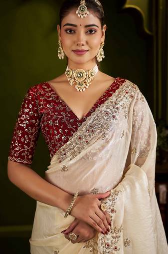 Beige satin silk saree with red embroidered blouse