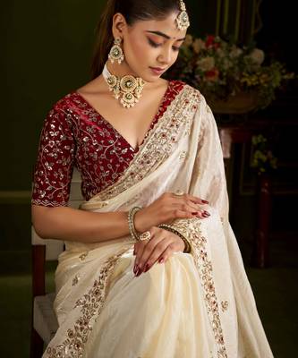 Beige satin silk saree with red embroidered blouse 4