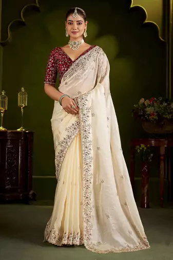 Beige satin silk saree with red embroidered blouse