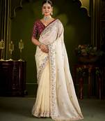 Beige satin silk saree with red embroidered blouse