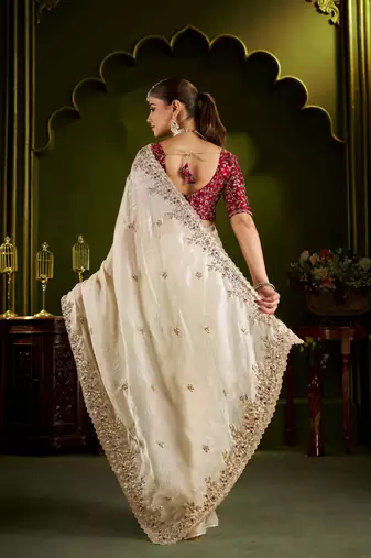 Beige satin silk saree with red embroidered blouse