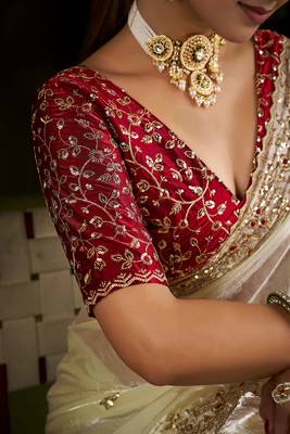 Beige satin silk saree with red embroidered blouse 6