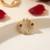 Gold plated american diamond pressing nose ring nath