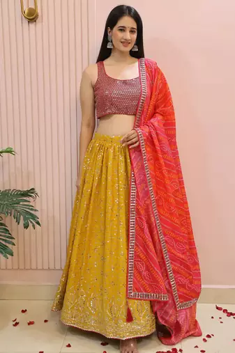 Yellow zari work georgette haldi lehenga with blouse